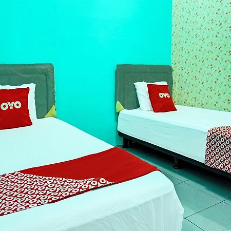 Oyo 91731 Home Stay Elis Cateliya Syariah 加拉旺 外观 照片